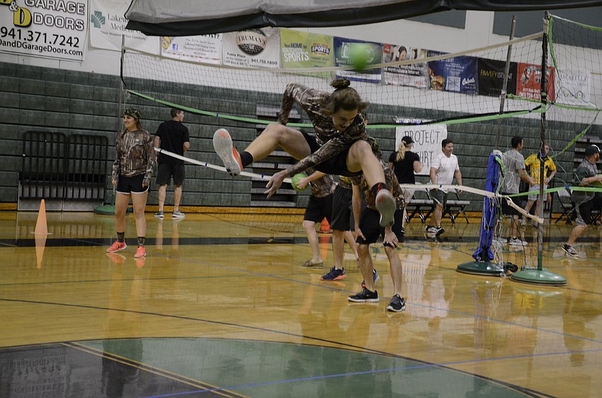 Nate Gross with the Invisibles team dodges a ball Matrix-style.