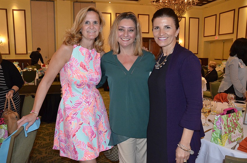 Amy Smith, Lilly Pulitzer at UTC Mall store manager, and Jessica Ortiz and Violeta Huesman of Lakewood Ranch