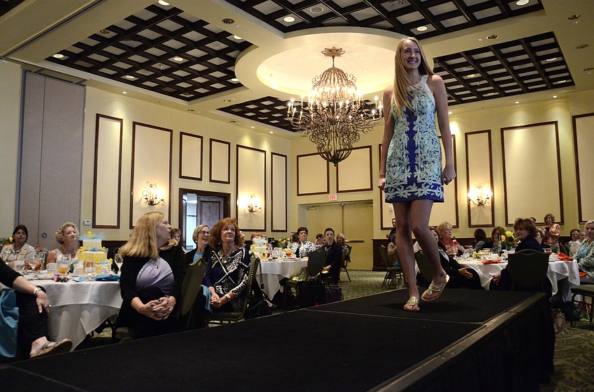 Connor Kirkland models a shift dress.