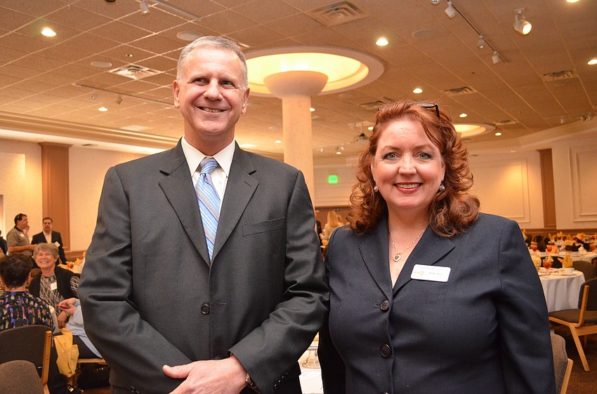 University of South Florida economics professor Phillip Porter and Tiger Bay Club board President Susan Nilon.