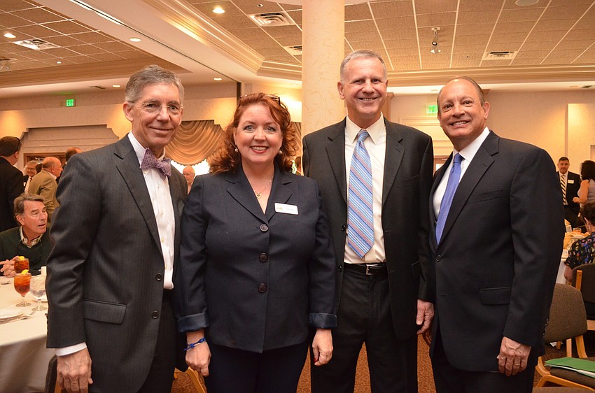 Tiger Bay Club Board President Susan Nilon with panelists Matt Walsh, Dr. Phillip Porter and Mark Huey president & CEO for the Economic Development Corporation of Sarasota County.