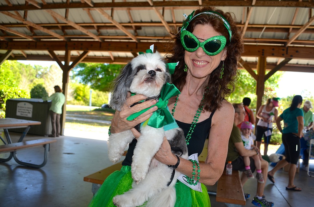 Twelve-year-old Buttercup and her owner, Ronna Williams, are frequent participants in the Lucky Dog Parade.