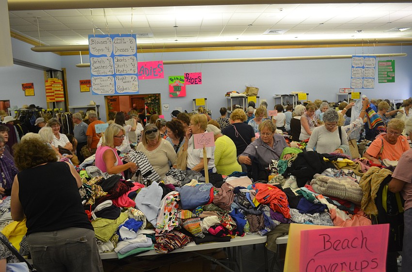 Shoppers attend the Early Bird Rummage Sale March 4.