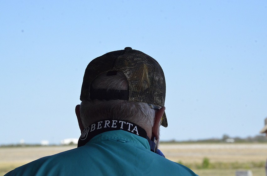 Rex Jensen gets ready to shoot with a pair of Beretta earmuffs.