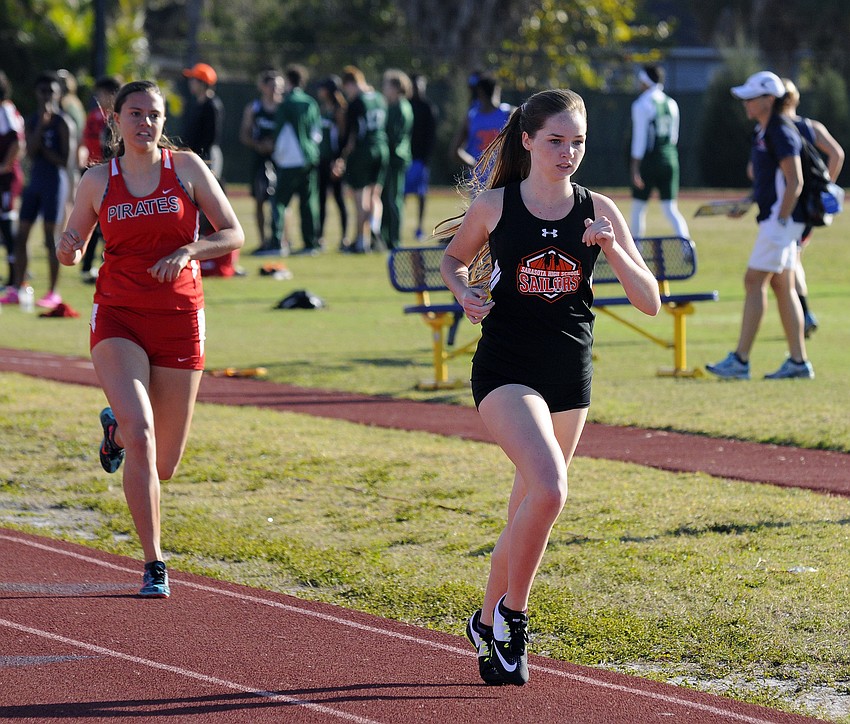 Sarasota's Breanna O'Keefe holds off Port Charlotte's Delaney Gerofsky in the consolation 800.
