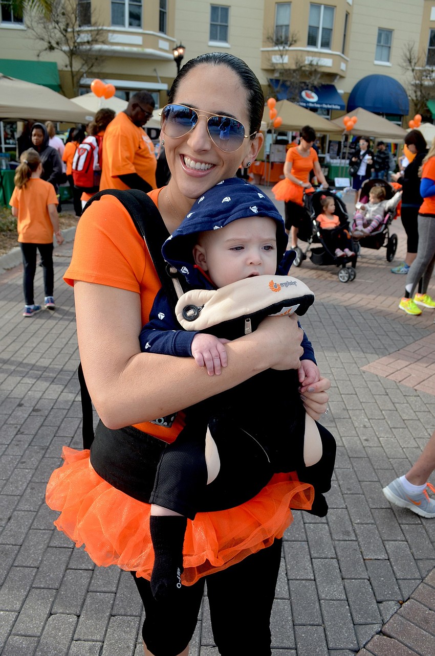 Sheena Lambright brings her son, Preston, along for the walk.