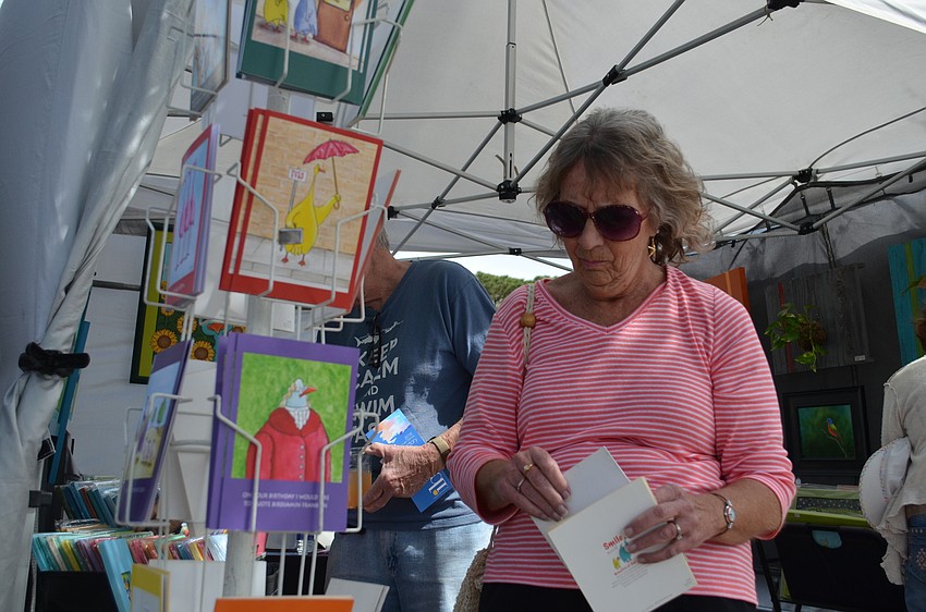 Carol Gileski scopes out the greeting card selection.