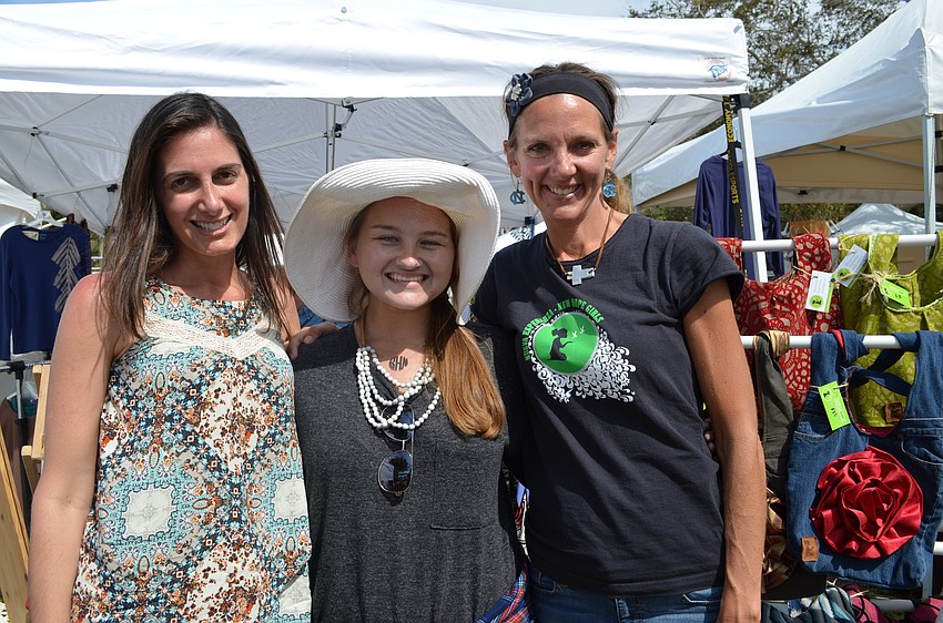 Rebekah Nouri, Bailey Hamel and Tonya King sold handbags, sandals and jewelry to benefit the New Hope Girls Academy.