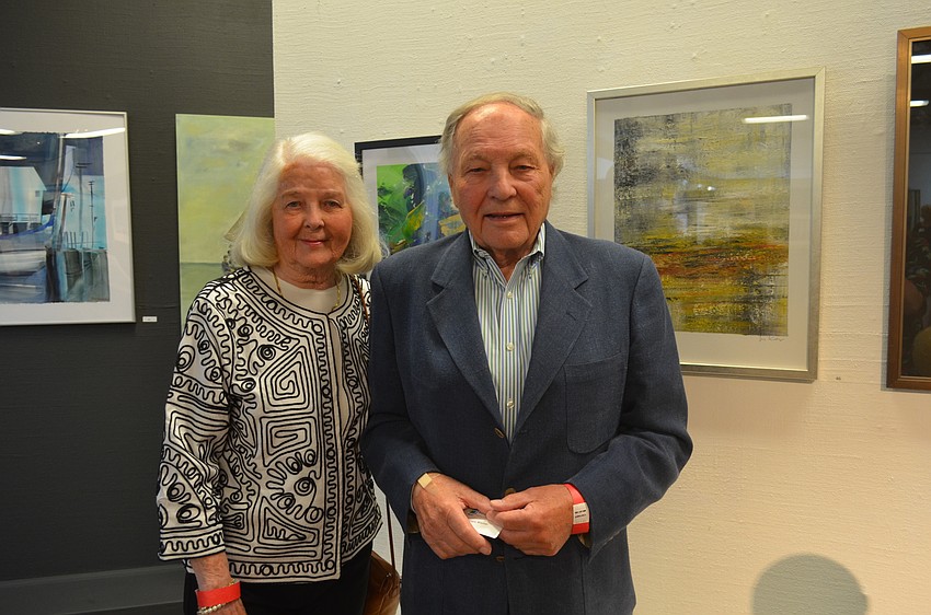 Artist Hans Wiemer, right, and wife, Gail, with “Intermezzo”