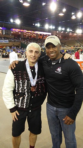 Braden River junior Chance Sharbono, pictured with coach Clarence Arrington, became the first Pirate wrestler to earn a state medal after finishing third in Class 2A at 138 pounds. (courtesy photo)