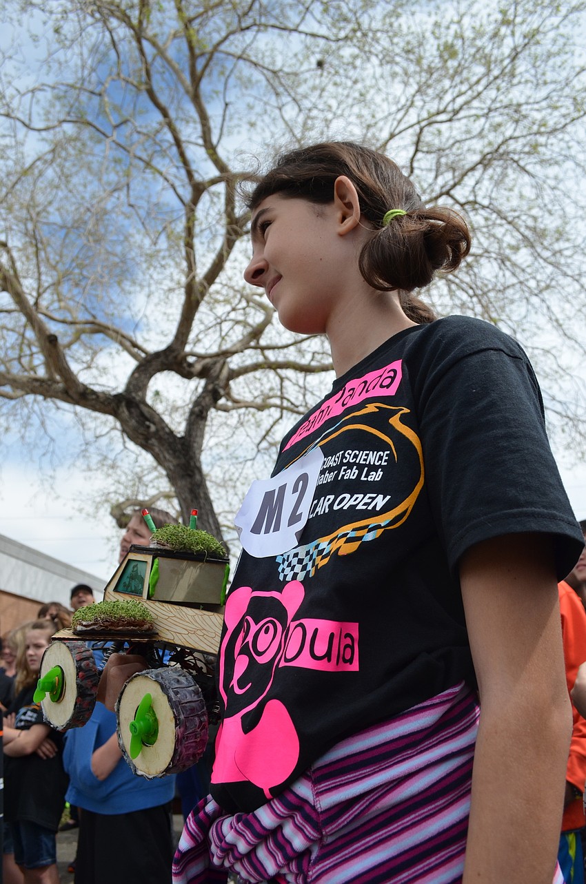 Oula Winder of Team Panda with her car. Winder along with her sister Kia Winder took home the first place prize for most most eco-friendly car.
