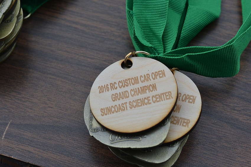 Everything used for the event was designed and created using resources from the Suncoast Science Center. These medals were accompanied by a wooden medallion carved and engraved using machines at the center.