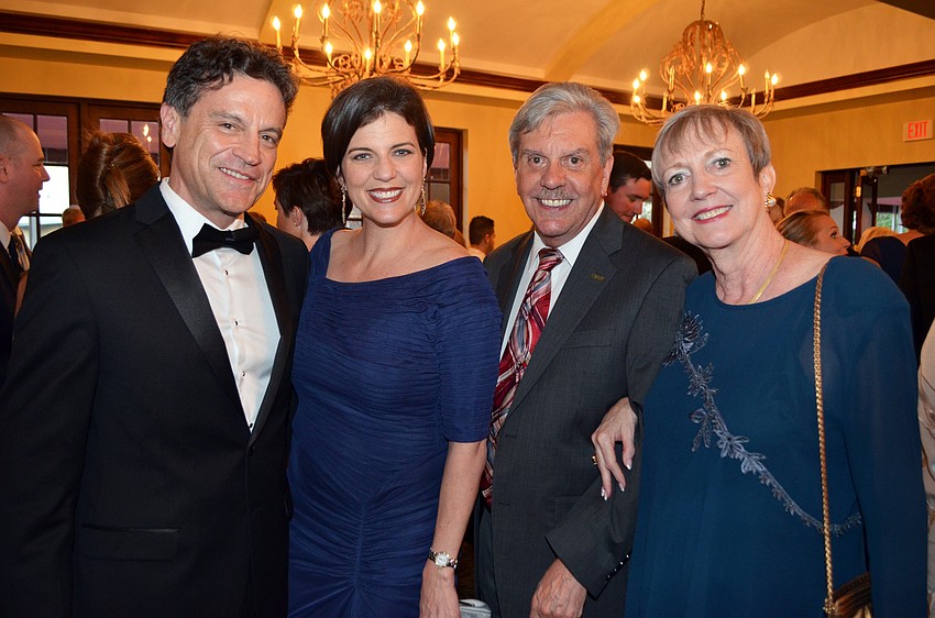 Bart and Kameron Hodgens with Dr. Arthur and Lynn Guilford