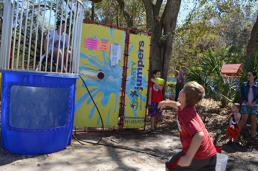 Chase Smith takes his turn at trying to dunk Bryce Berkowitz.