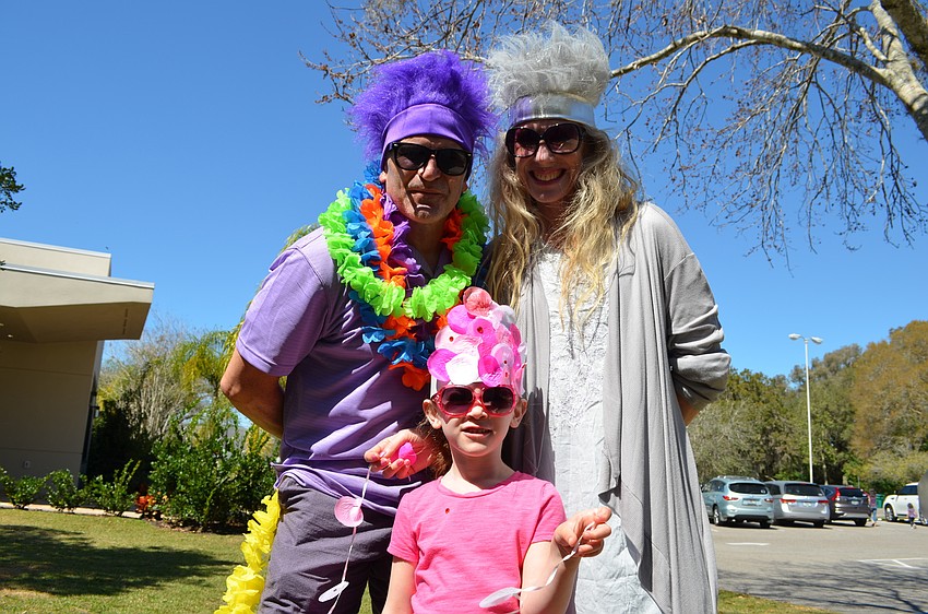 Jeffery, Lenore and Maxine Gould sport their festive costumes for the annual Purim celebration.