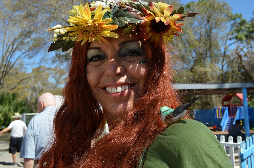 Sabrina Silver's Mother Nature costume included a little bird on her shoulder.