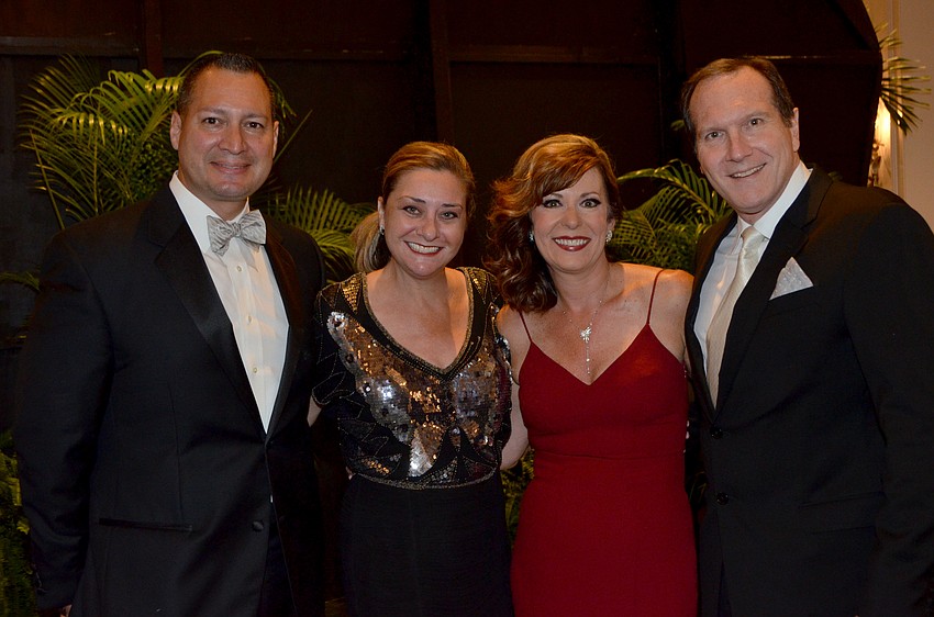 Tav and Jessica Ortiz with Michelle and Keith Senglaub