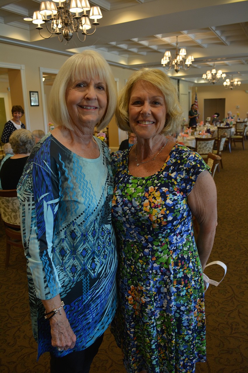 Kaye Kuzell, event chairwoman, stands with Susie Wolff.