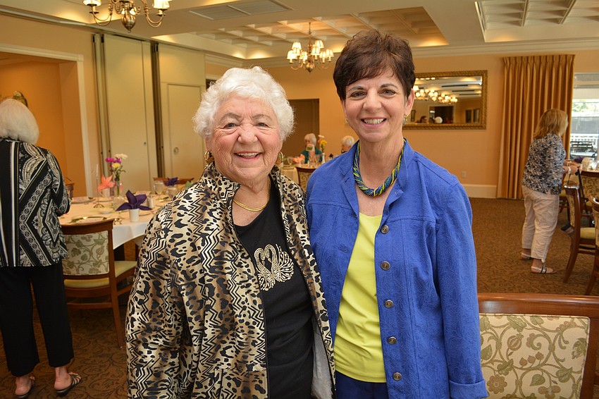 Gloria Mazz and Marge Placio make sure to buy raffle tickets.