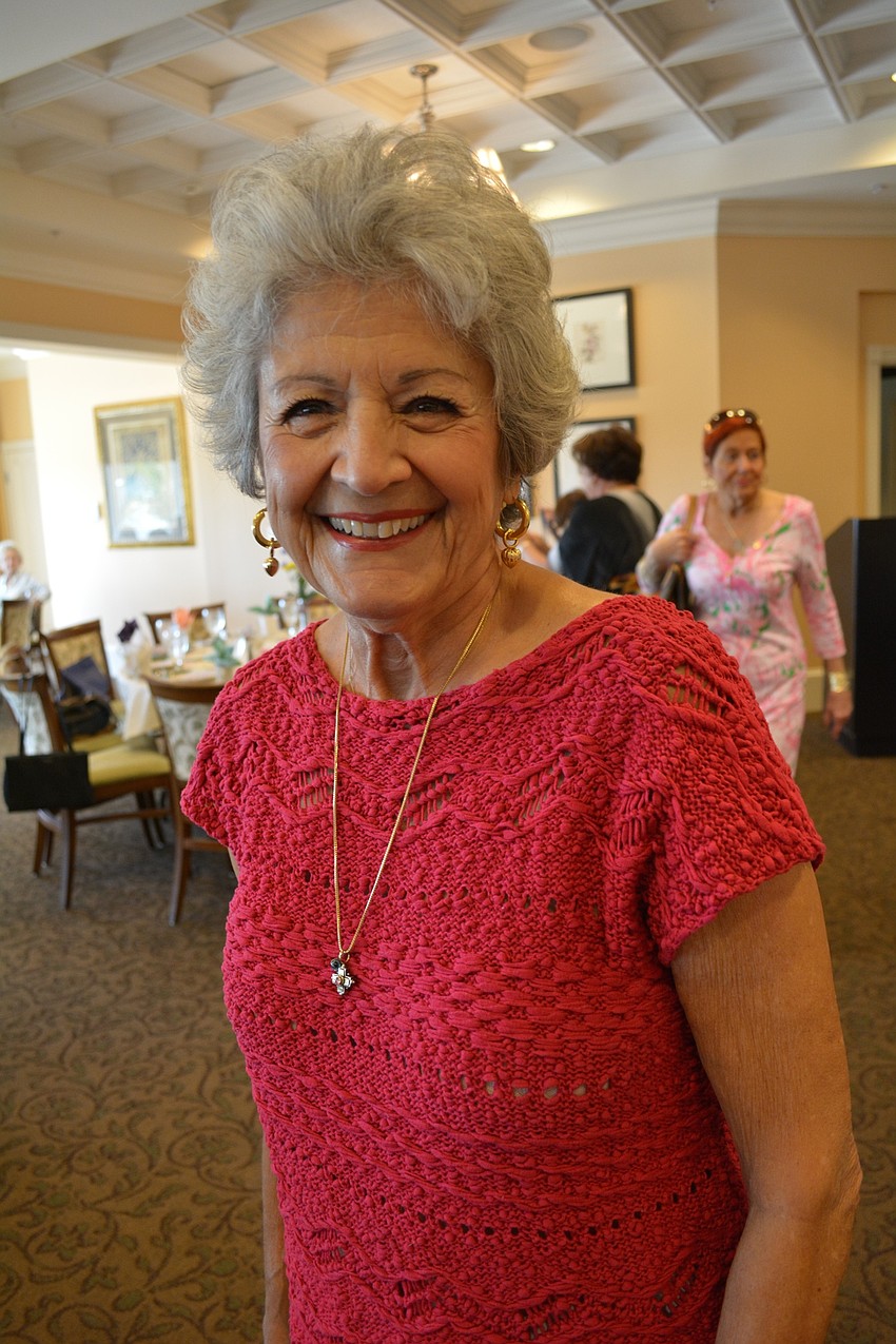 Helen Scathis attends to support the club's activities.