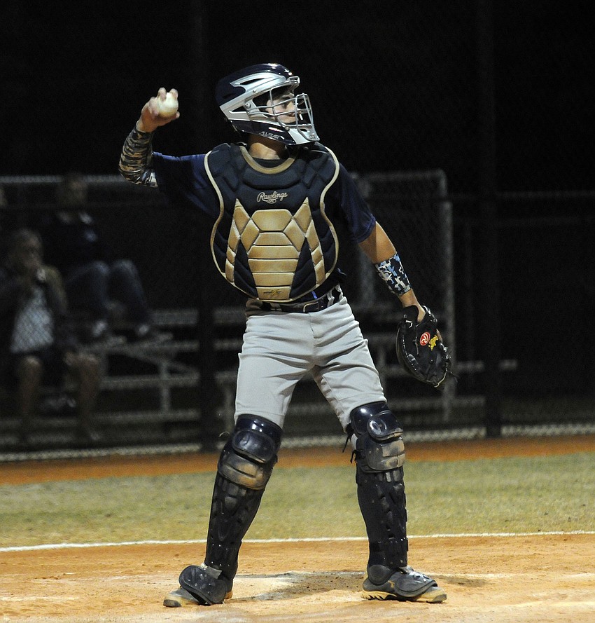 ODA senior catcher Parke Phillips tosses the ball back to the mound.