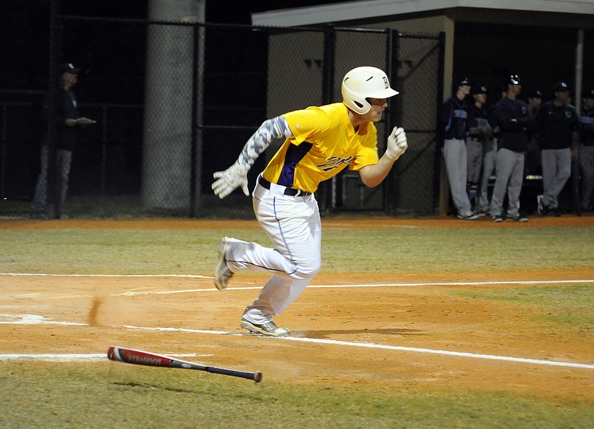 Booker outfielder Nick Terzian races down the first base line after hitting a two-run double.
