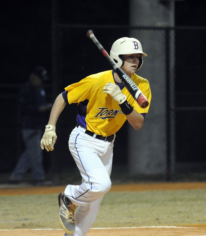 Booker senior Jake Underhill trots down to first base after drawing a walk.