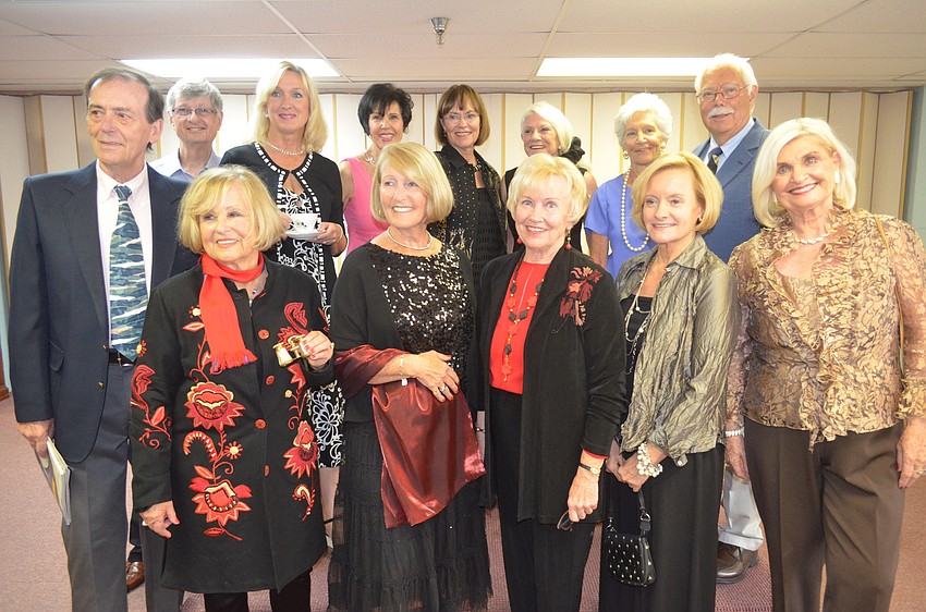 Models and volunteers gather after the show.