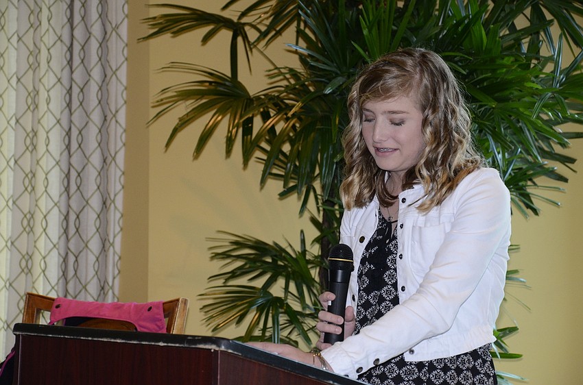 Carli Kasten, a Nolan Middle School student, said explained what cystic fibrosis was to about 90 luncheon attendees.