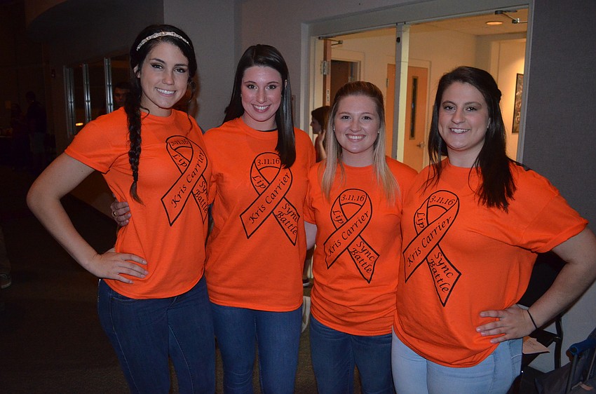 Student Government Association members Emily McNulty, Kennedy Hunter, Meagan Gigliotti and Sarah Crawford show off their shirts for the event.