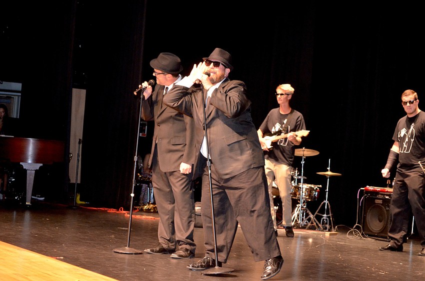 Assistant Principal Don French shows off his dance skills while performing 