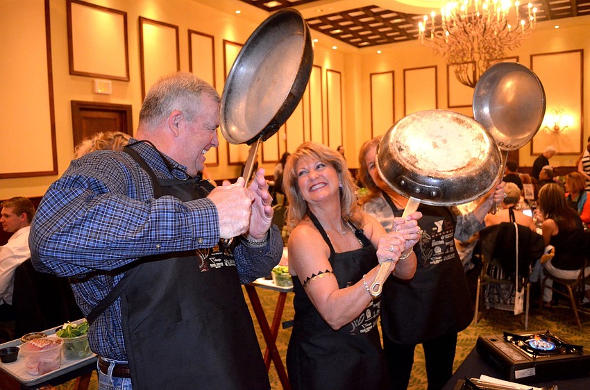 Mac Gregory and Bev Kinder enjoy friendly competition.