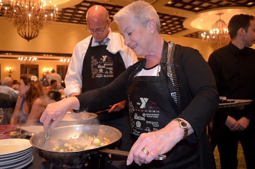 Teri Runo has cooked fish before, but is still nervous about her table side cooking demonstration.