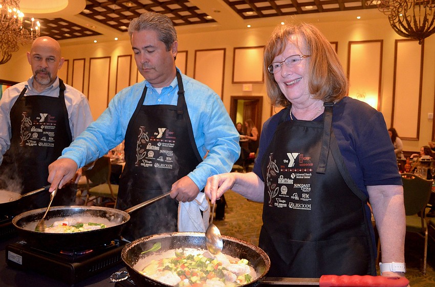 Doug Rothauser, J.J. Miranda and Sandy Barnidge team up to cook couscous and seafood.