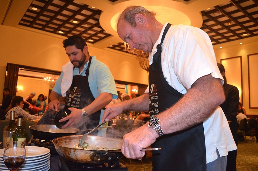 Rod Silva and Steve Forristan finish up their meals.
