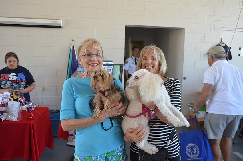 Commissioner Lynn Larson and Judy Boice, with Muffin and Chantal