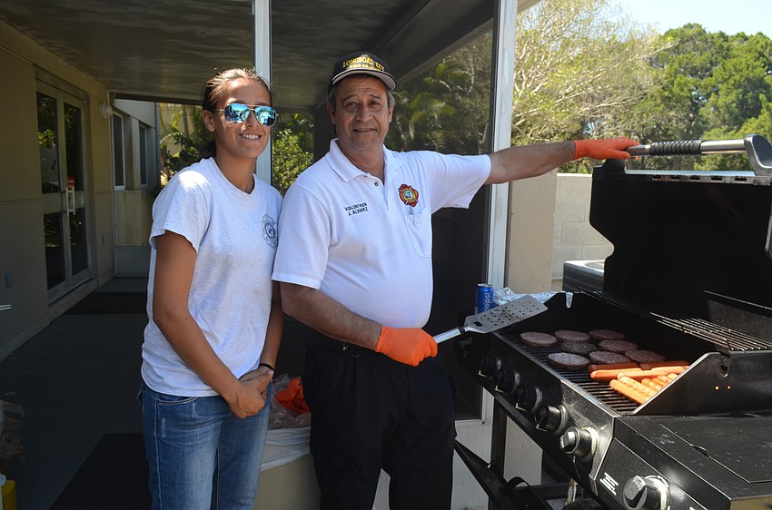 Elizabeth and volunteer firefighter Jorge Alvarez