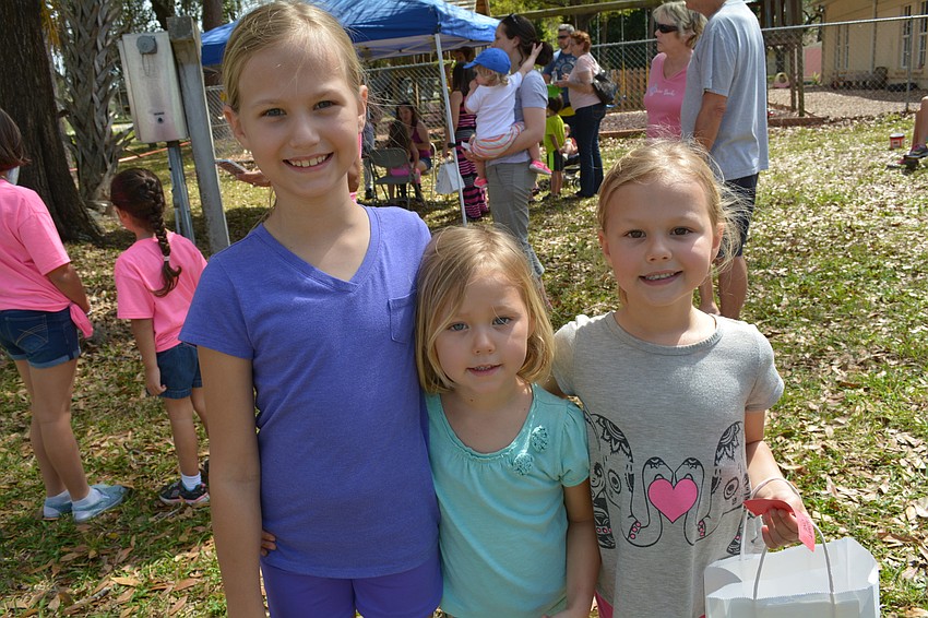 Madeline, Evelyn and Leighton Paul enjoy the festivities.