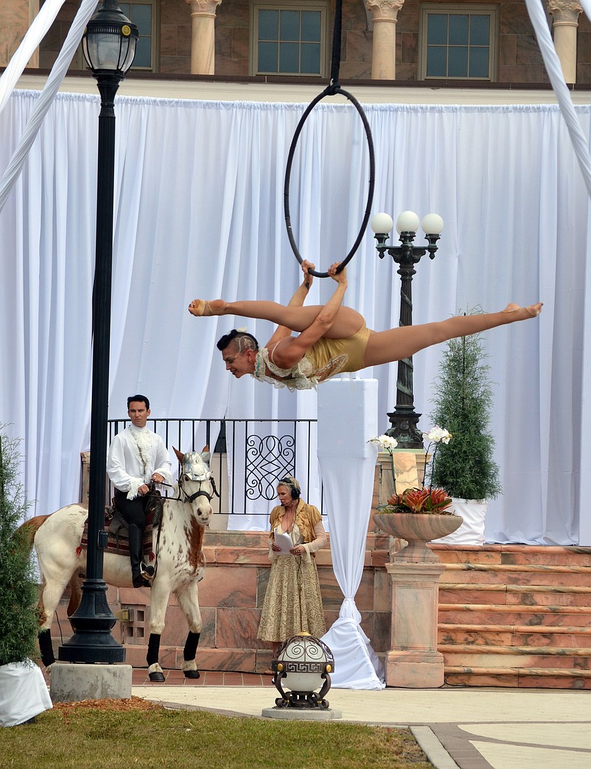 Aerial artists performed before the fashion show.