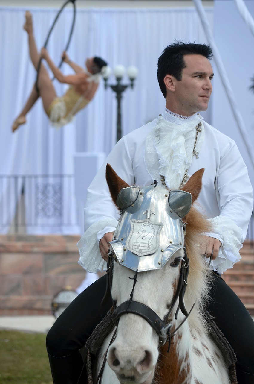 Aerial artists performed before the fashion show.