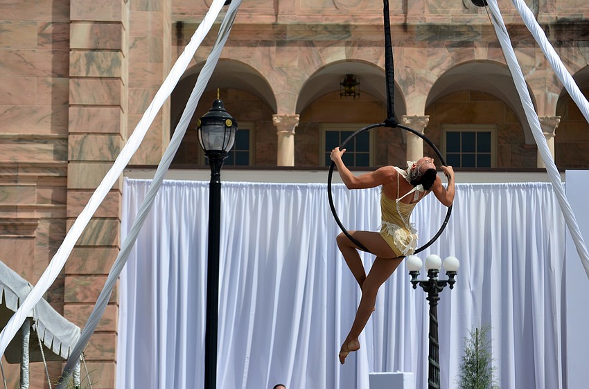 Aerial artists performed before the fashion show.