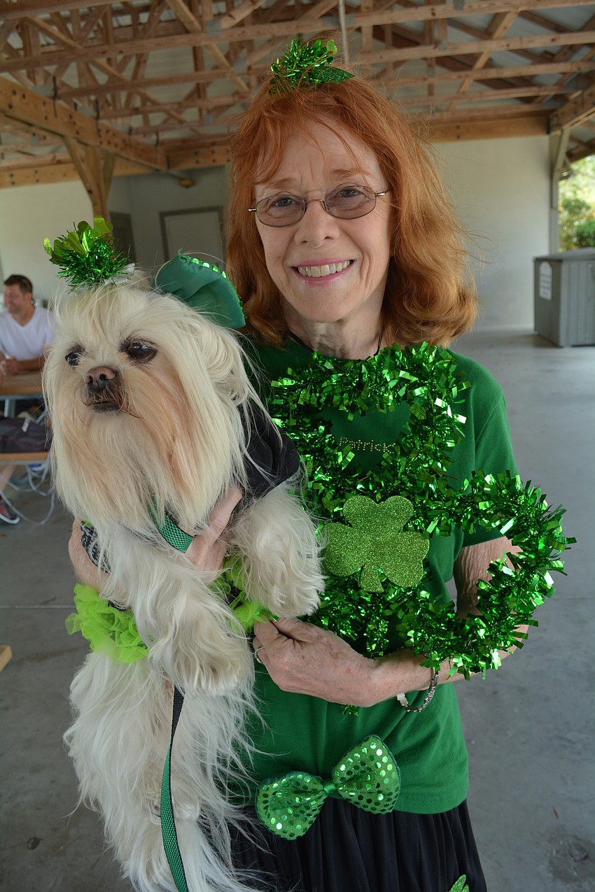 Sarasota's Kathleen Trost entered the dog parade with her dog, Chloe.