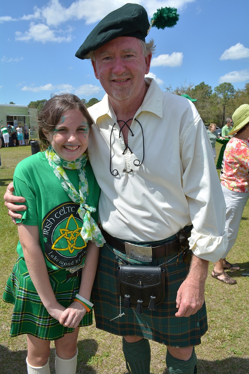 Emilee Gately, 12, helps her uncle, event organizer Frank Shea, throughout the day.