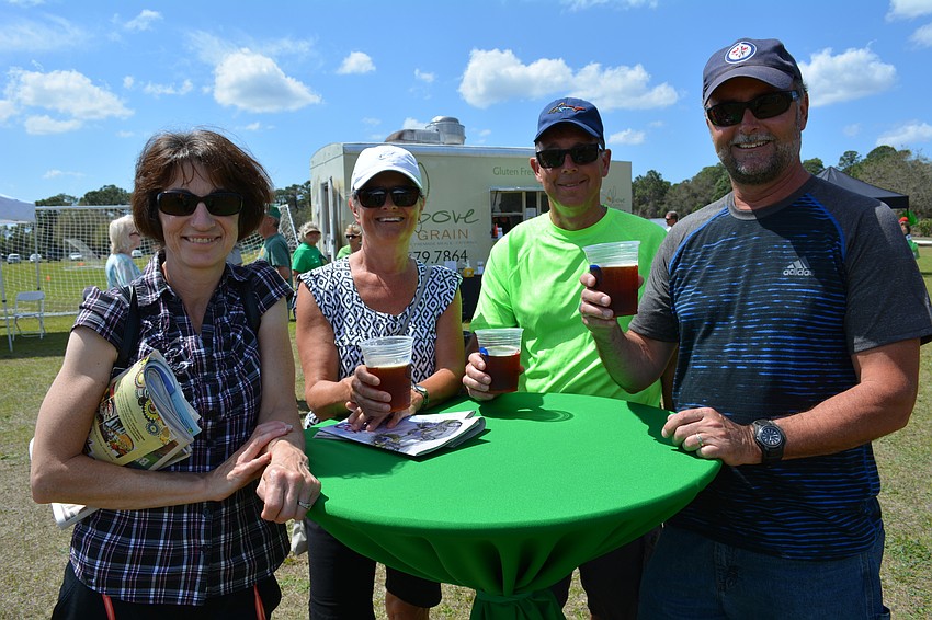 Rosanna Boutilier, Julie and Keith Fairservice and Mike Boutilier, of Bradenton, enjoy drinks together.