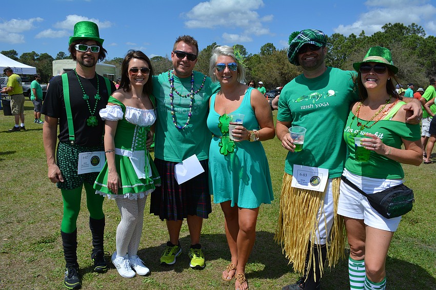 Dexter Carter, Alison Selzler, Matt Greiner, Megan Hallmark, Mike Lennox and Chrissy Lennox  dress for the relay race.