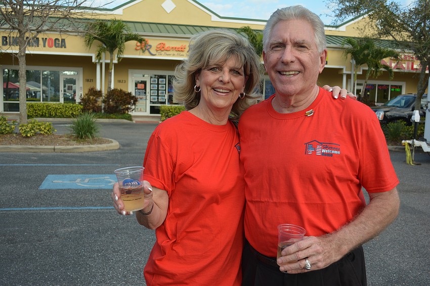 Lakewood Ranch's Carol and Gene Sweeney wear Heroes Welcome Home t-shirts. Event organizers Kelly and Tony Barrett formed Heroes Welcome Home to help military veterans.
