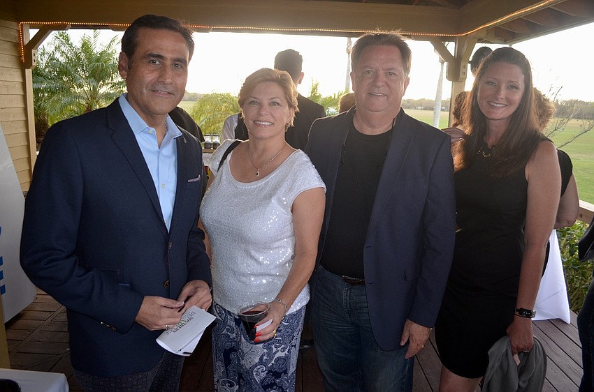 Joe Gran, Angela Massaro-Fain, John Fain and Morgan Havlan, of Next-Mark, enjoy a night out.