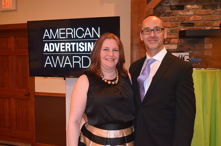 Adfed Suncoast Board of Directors members Deborah Carr and Lee Gaines host the event.
