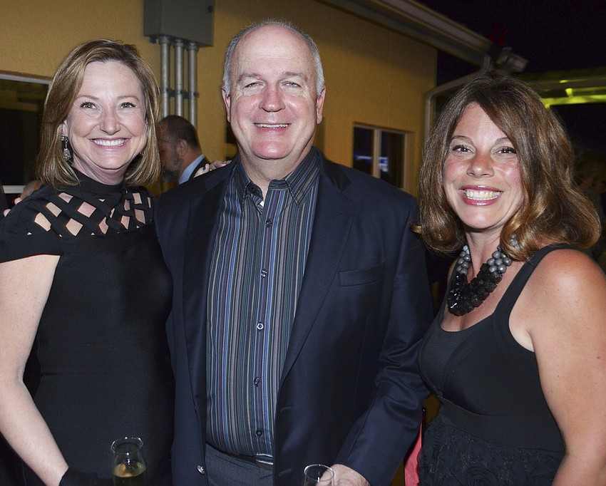 Nancy and Robert Harrison with Jessica Banks
