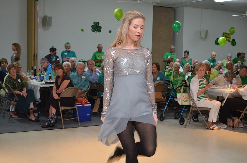 Dancer Kelsey Miko performs for guests at the St. Michael Archangel Catholic Church Irish Celebration.
